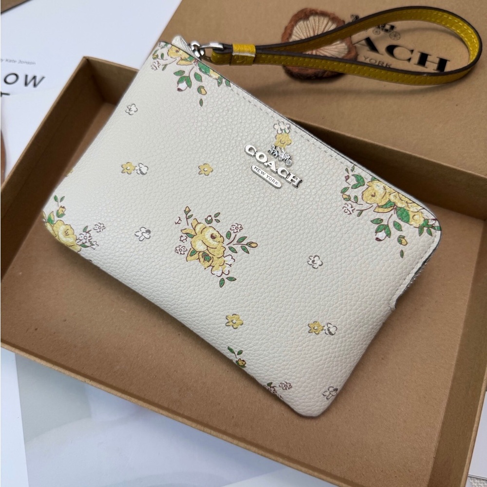Coach Cream Floral Wristlet with Yellow Strap